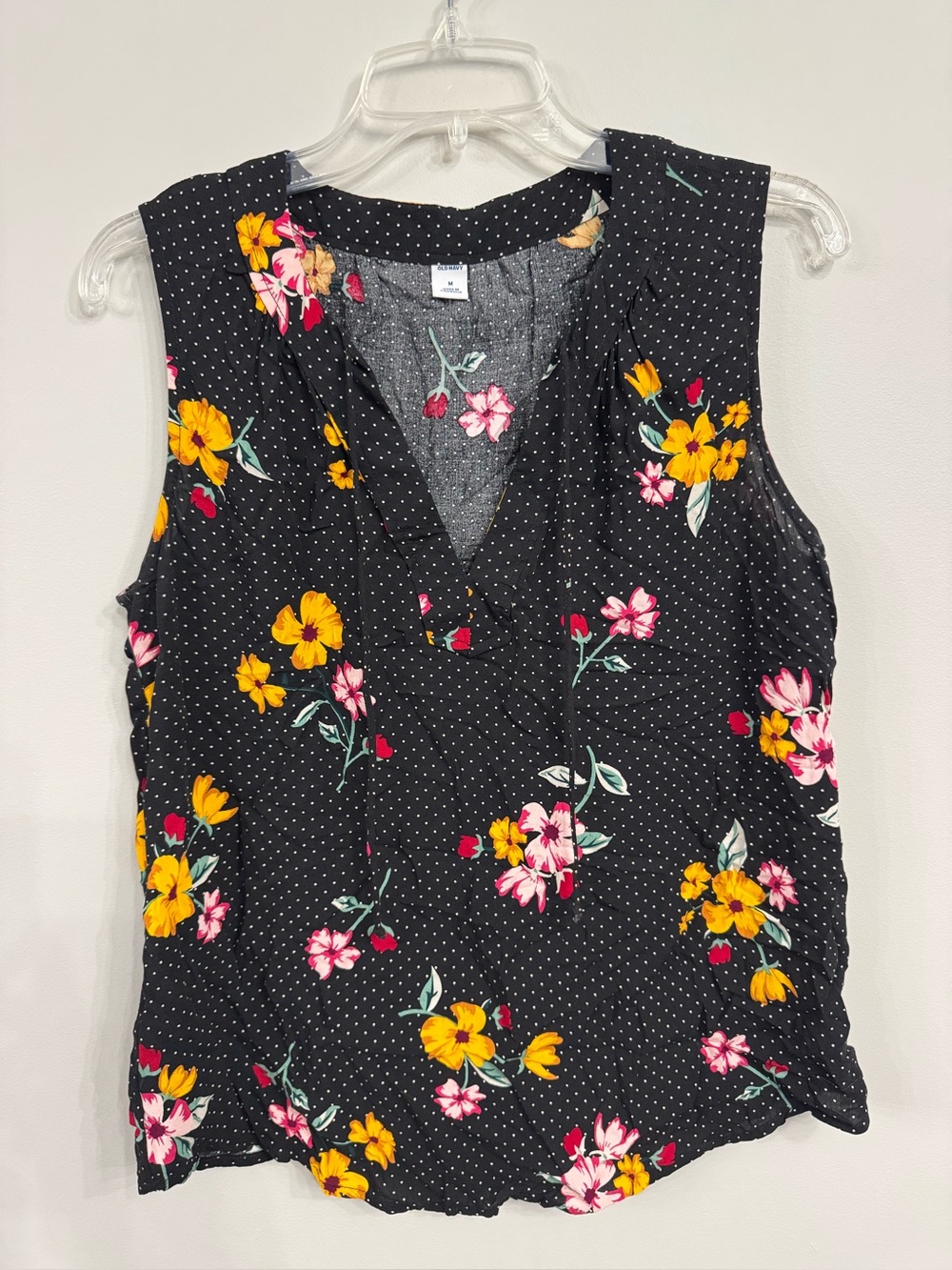 Old Navy black sleeveless v-neck featuring a polka dot & floral pattern Medium